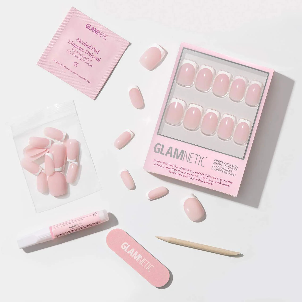 GlimmerPop nailist press on nails in soft pink with adhesive and application tools for easy use